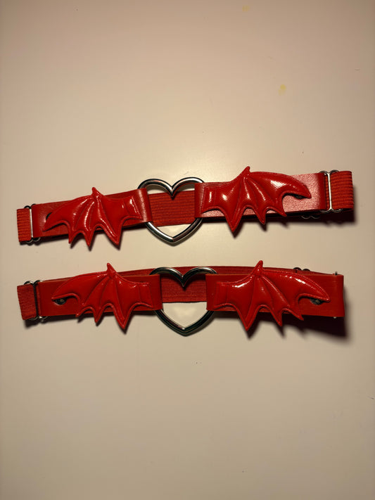 Coppia di reggicalze rossi